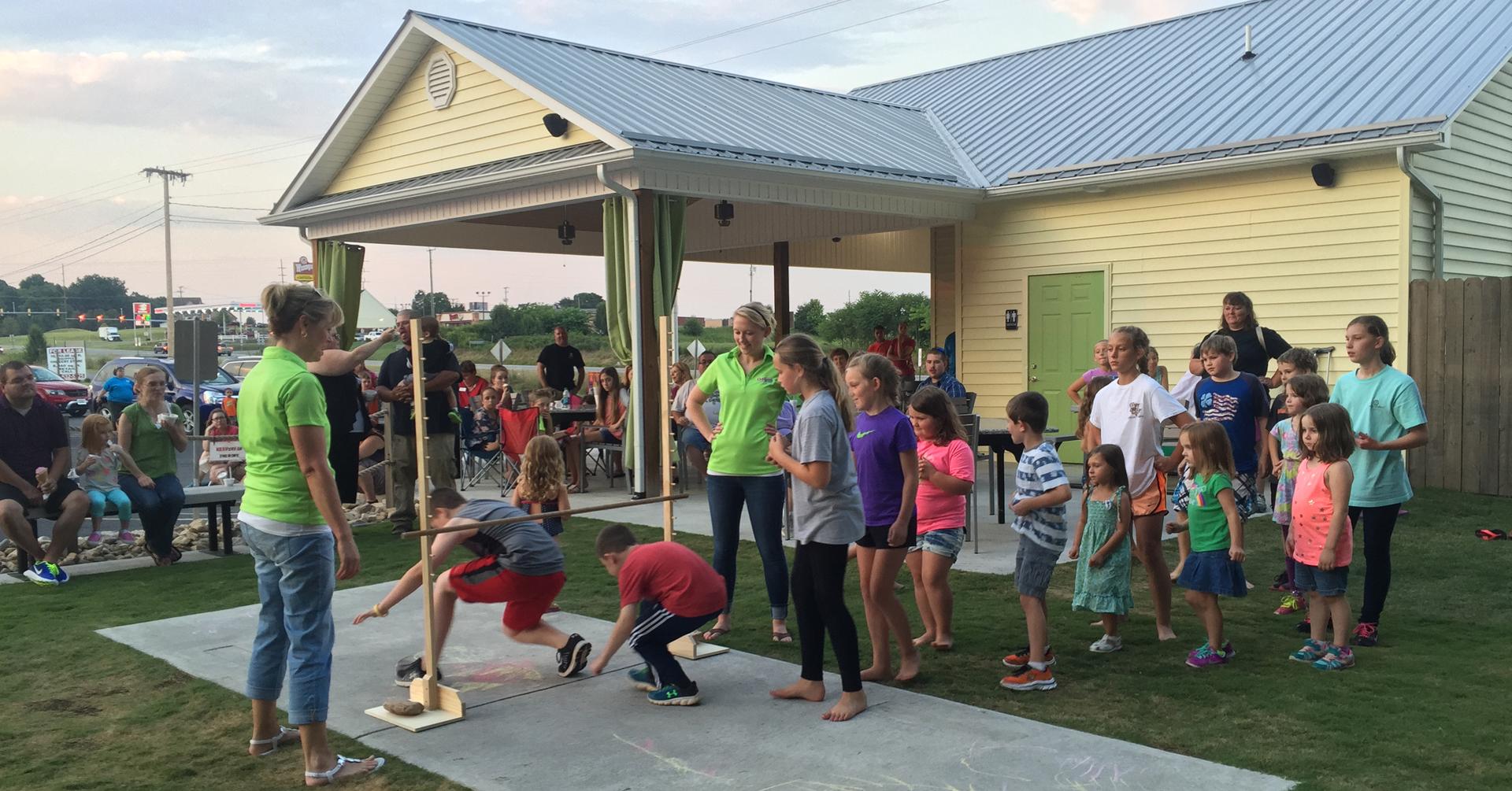 Children Playing Limbo