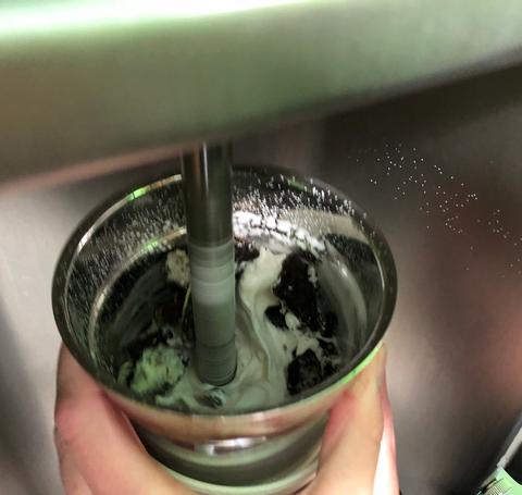 Mixing a milkshake.