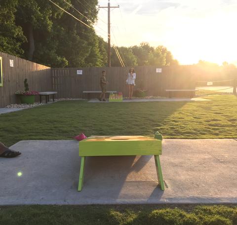 Corn-hole boards set up for a game.