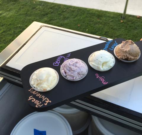 Ice cream on a tasting board.